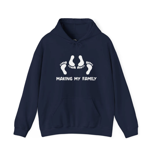 Navy hoodie featuring the "Making My Family" design with a sarcastic and playful adult humor twist. Ideal for men who appreciate subtle humor.