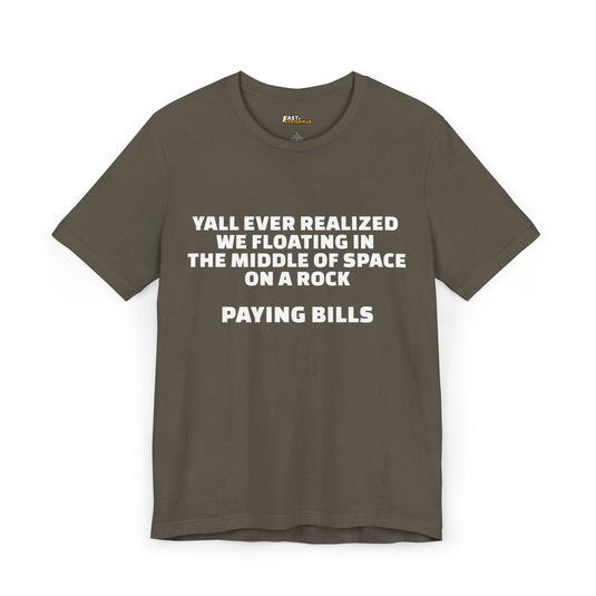 Army green unisex tee with a humorous statement about the absurdity of paying bills while floating in space.