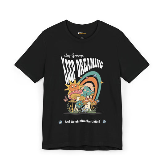 Black t-shirt featuring a psychedelic dreamscape with a "Keep Dreaming" message, perfect for rave and festival lovers.