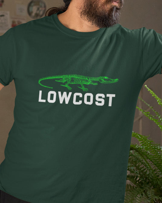 Green graphic T-shirt featuring a humorous brand parody design with a crocodile skeleton and "Lowcost" text, ideal for trendy fashion enthusiasts.