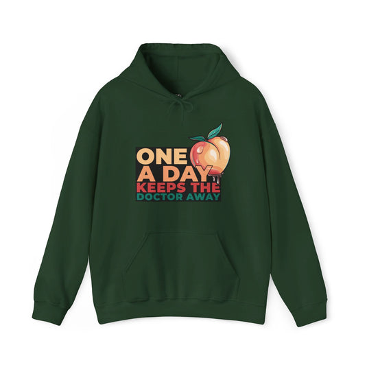 Forest green hoodie for men and women featuring a playful 'One A Day Keeps the Doctor Away' design with a peach graphic.