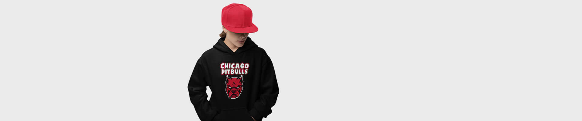 Person wearing a comfy black graphic hoodie with a red hat, designed with a twist of humor, ideal for men and women seeking fun styles.