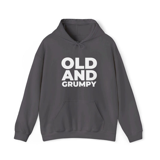 Charcoal grey hoodie for men and women featuring a bold 'Old and Grumpy' design, perfect for sarcastic humor lovers.