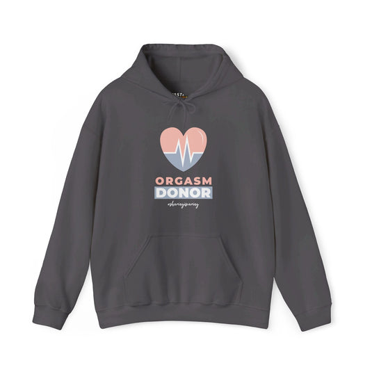 Charcoal grey hoodie for men with playful "Orgasm Donor" text and heart graphic, perfect for sarcastic and bold style.