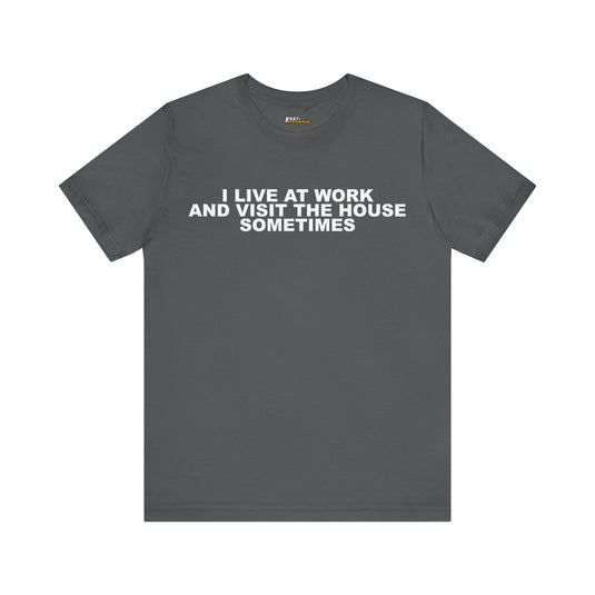 Asphalt grey tee for men and women with a humorous 'I Live at Work' graphic, ideal for sharing your work-life frustrations.