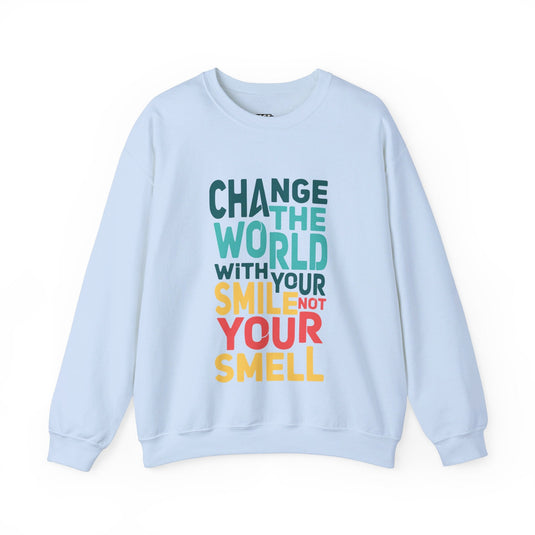 Light blue sweatshirt with the playful "Change the World with Your Smile, Not Your Smell" design, ideal for men and women who love humor.