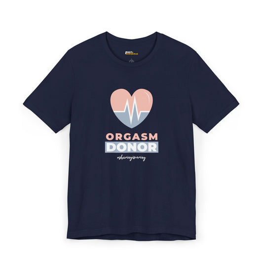 Navy blue men’s tee with a heart graphic and the cheeky text 'Orgasm Donor,' perfect for those with a playful sense of humor.