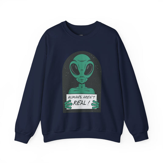 Navy sweatshirt showcasing a witty alien graphic with a sign reading "Humans Aren't Real!" for a sarcastic touch