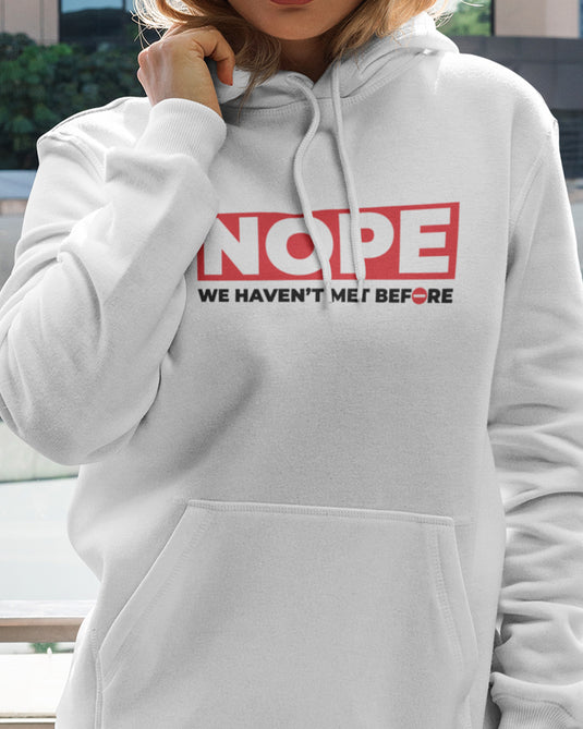 White graphic hoodie with funny and sarcastic "Nope, We Haven't Met Before" text, ideal for bold statement fashion lovers.