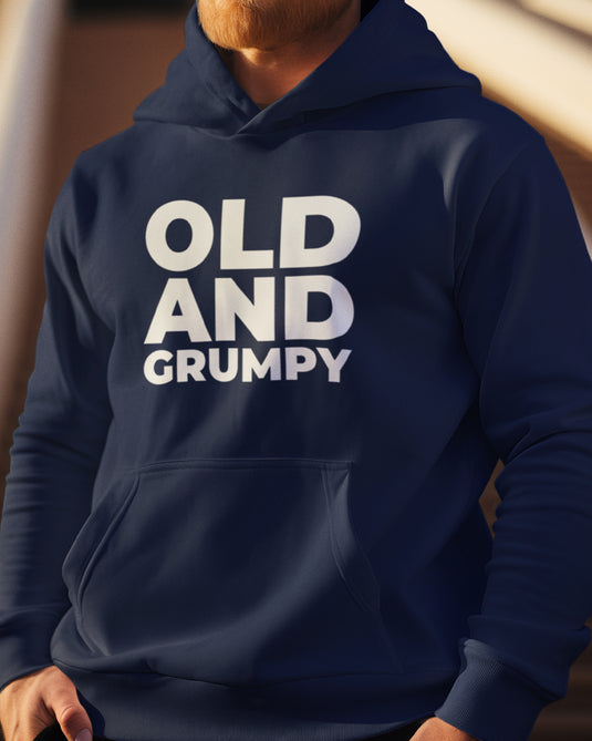 Navy blue graphic hoodie with "Old and Grumpy" text, perfect for sarcasm lovers seeking bold statement apparel for men and women.