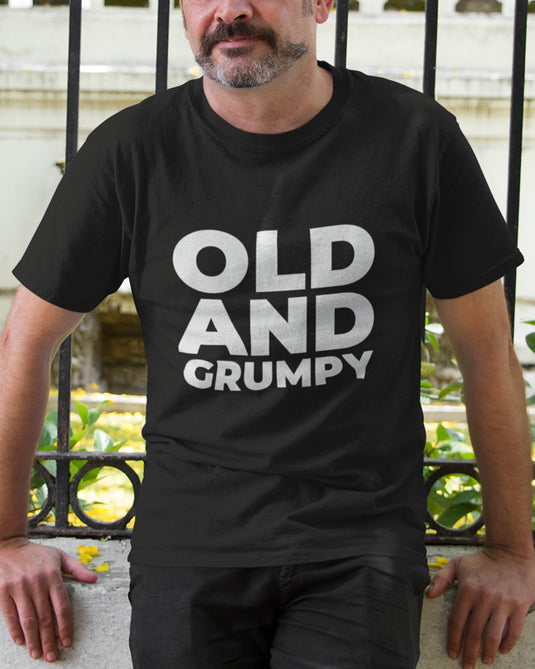 Black graphic T-shirt with bold "Old and Grumpy" text, perfect for humor enthusiasts and sarcastic statement lovers.