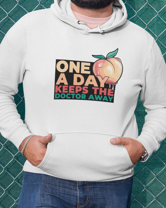 White graphic hoodie with funny "One a Day Keeps the Doctor Away" peach design, perfect for unisex bold statement fashion.