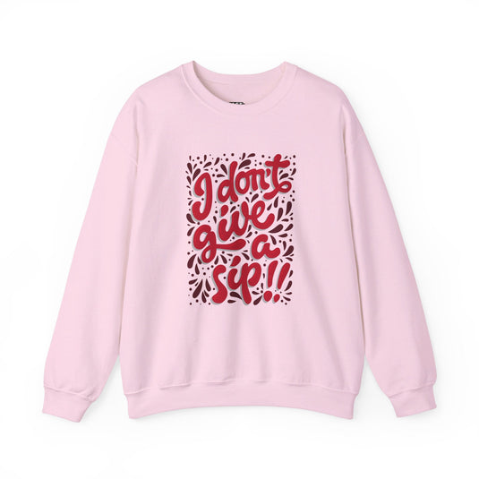 Pink sweatshirt with the witty "I Don't Give a Sip" design, ideal for women who enjoy wine and humor.