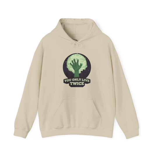 Sand-colored hoodie for men and women featuring a sarcastic "You Only Live Twice" design with a spooky zombie graphic.