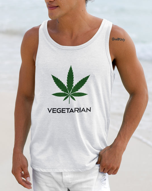 Man wearing a white graphic tank top with a cannabis leaf design and 'Vegetarian' text, ideal for weed lovers.