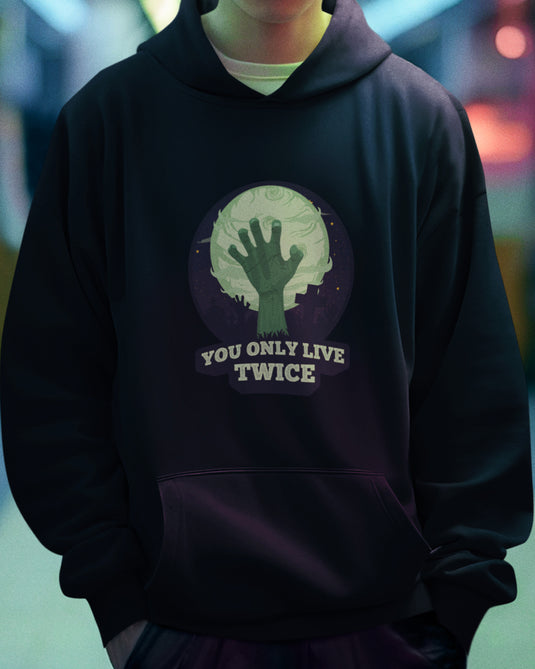 Black hoodie with "You Only Live Twice" zombie hand graphic, perfect for horror fans and Halloween enthusiasts.